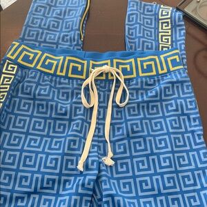 RS1NE Greek Key Print Pull-On Drawstring Track Pant. Zip Bottoms. Side Pockets.